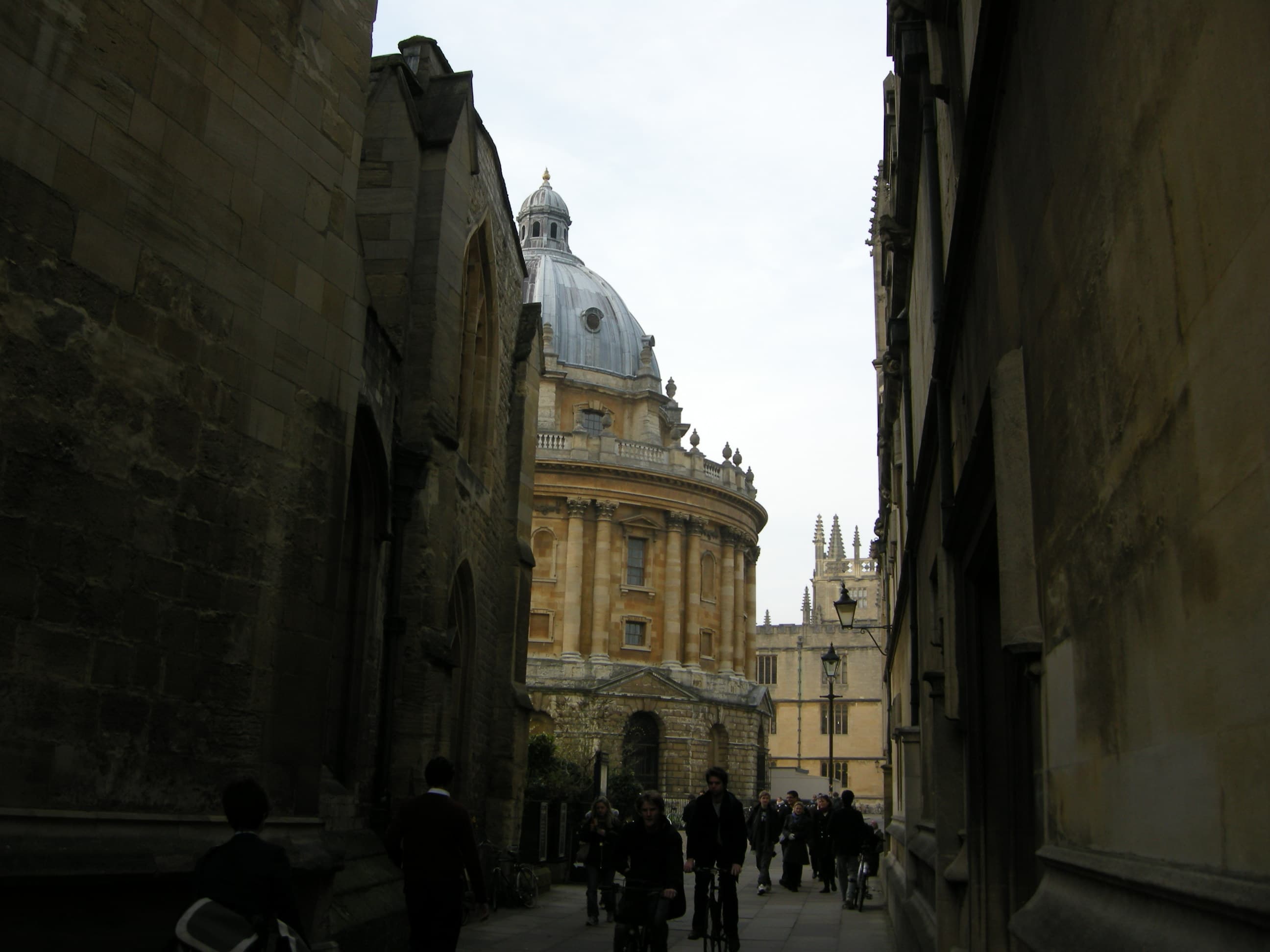 The Radcliffe Camera seen through an Oxford college lane